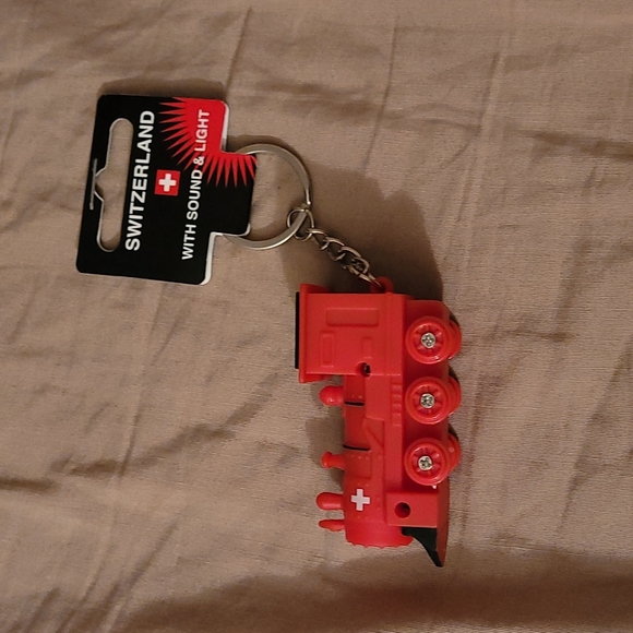 Red Train keychain from Switzerland has sound and light - Picture 1 of 5